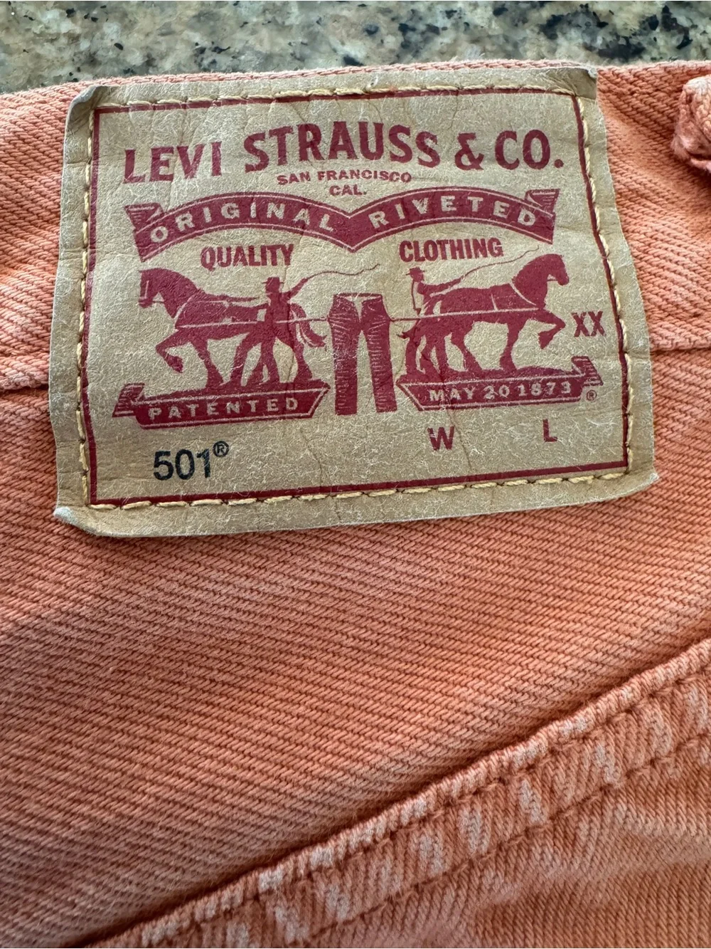 Levi's High-Rise Frayed Hem Shorts - peachy rust orange